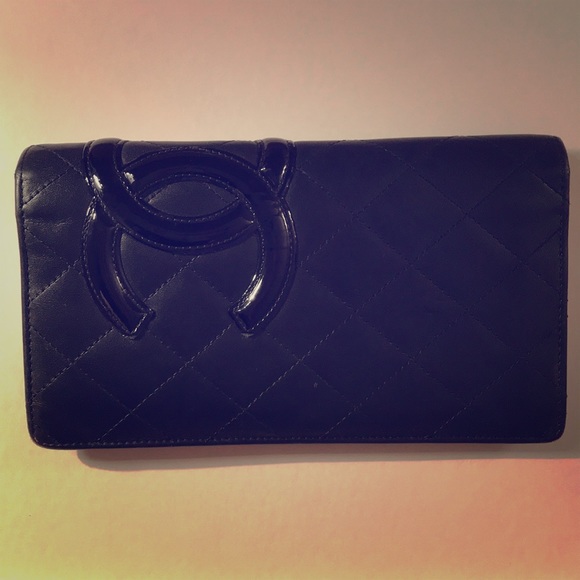 CHANEL Handbags - Authentic Chanel leather wallet with pink lining